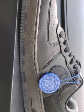 Nike Men's Black Leather Sneakers with Blue Tag